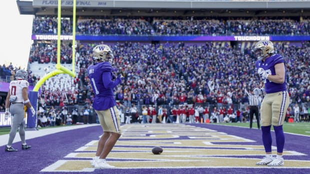 Rome Odunze celebrates his 40-yard TD catch with Jack Westover.